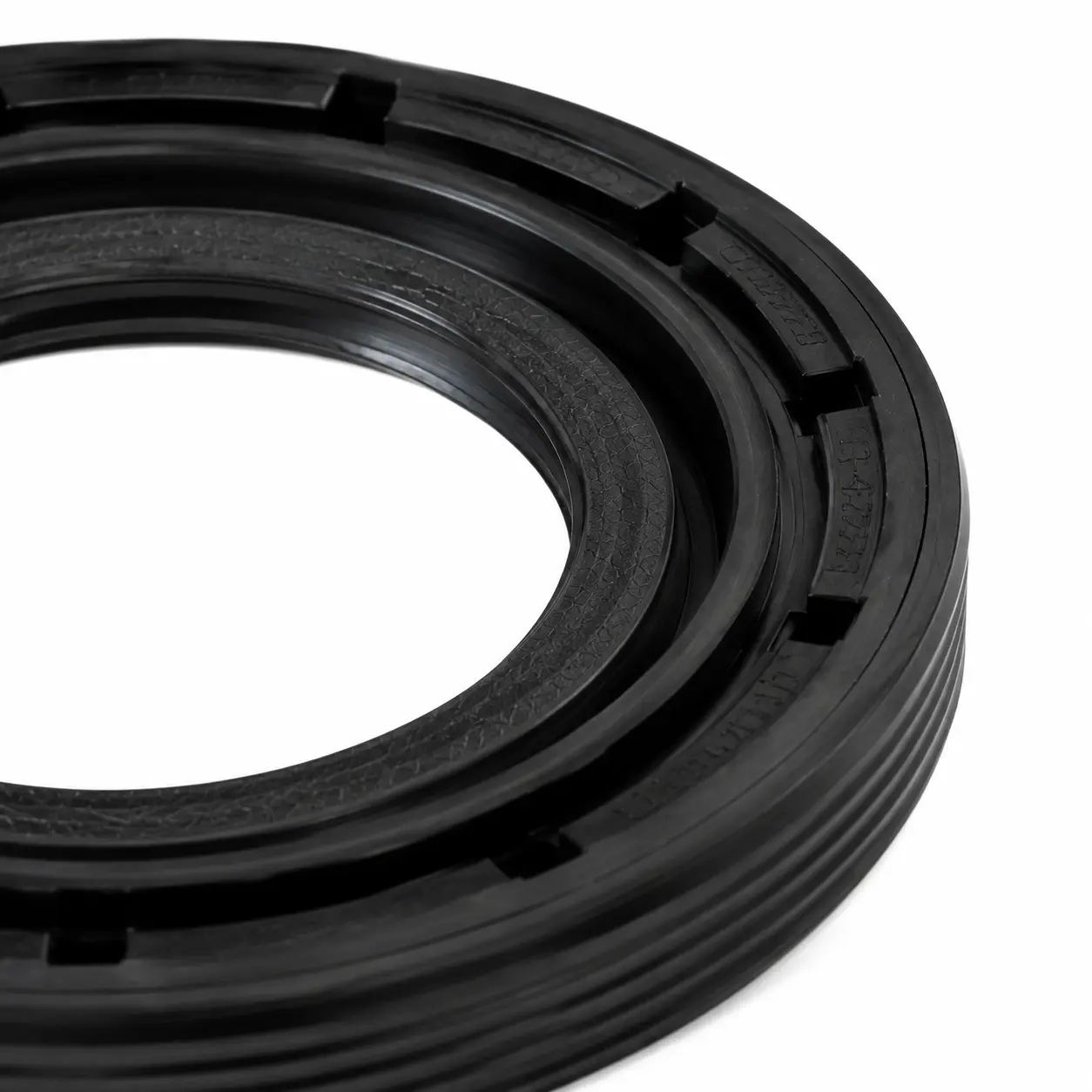 Close-up of Victor Reinz camshaft seal inner sealing lip and surface structure